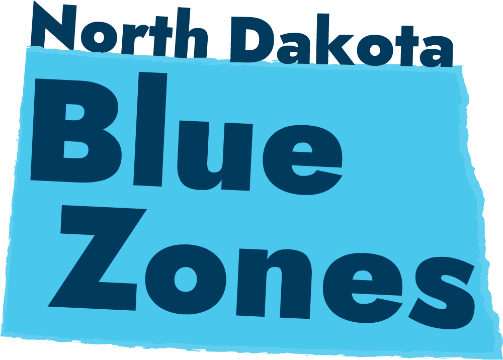 An illustration of the state of North Dakota with the words "North Dakota Blue Zones" on top of it.